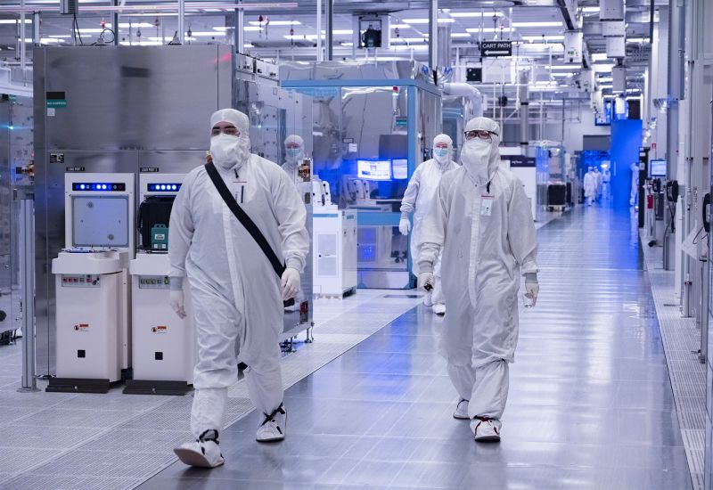 Intel shares rose 14% after reports of a deal with Apple.