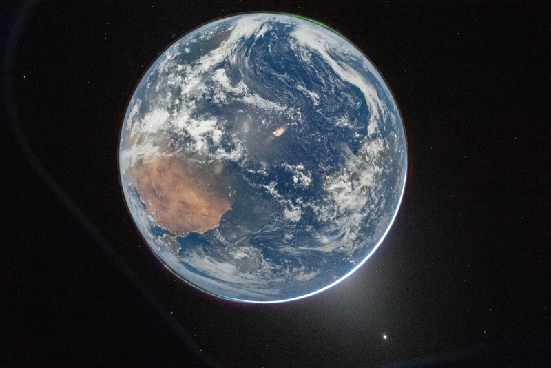 Commander Artemis II sent stunning photos of Earth from the lunar rover's porthole.